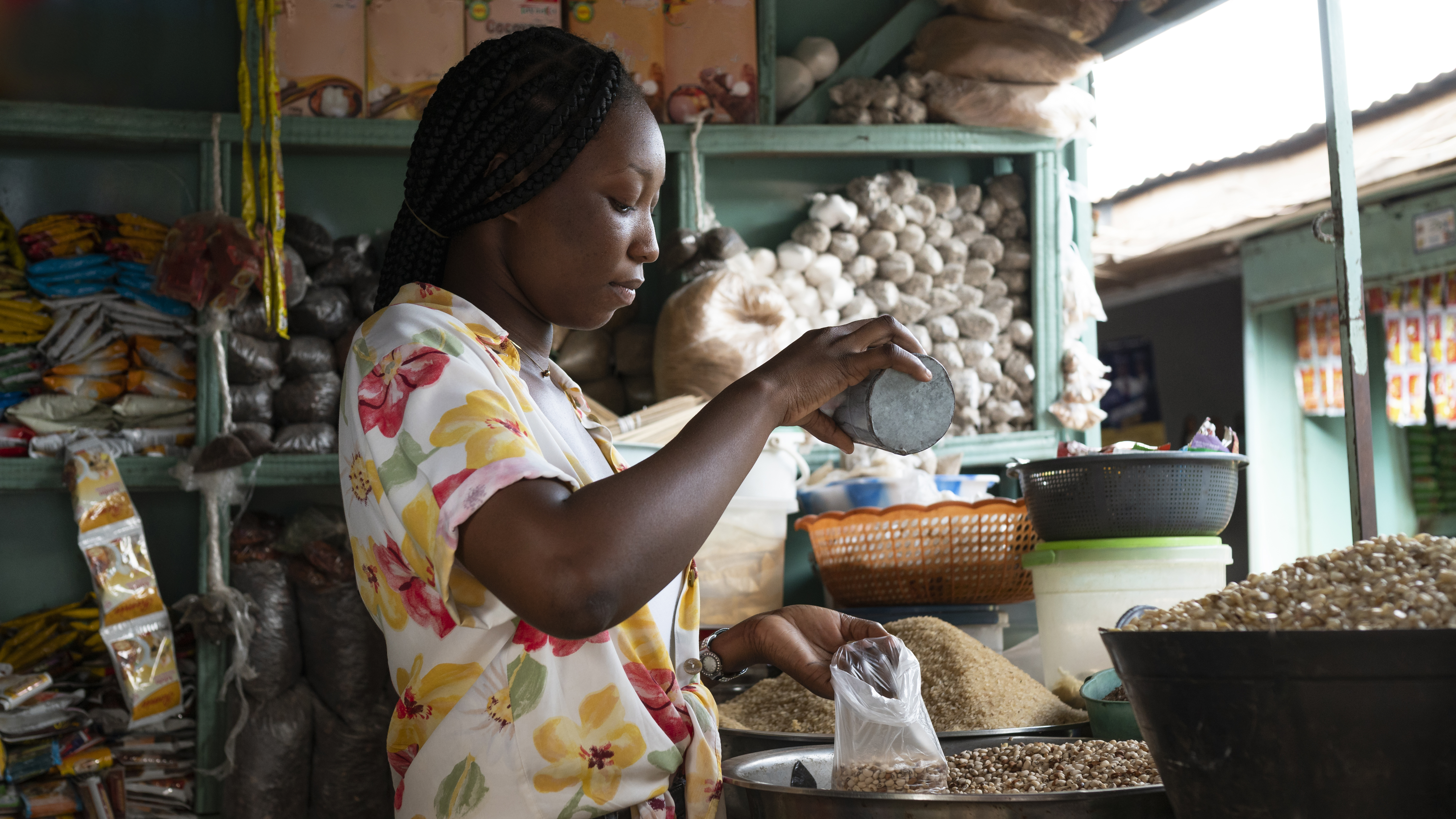 storage/photos/shares/medium-shot-african-woman-working.jpg